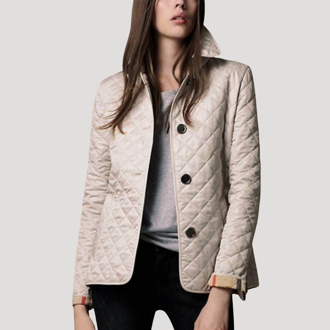 Veste matelassée femme, design élégant pour mi-saison. Confortable et tendance, parfaite pour le quotidien.