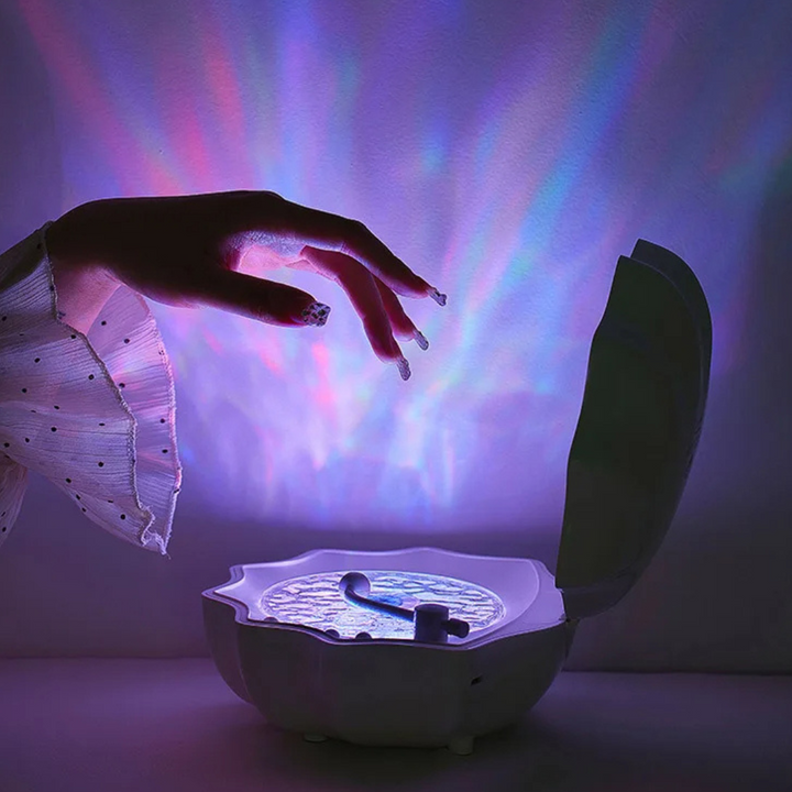 Haut-parleur WaveGlow portable avec projection lumineuse d'ondes marines, idéal pour musique et ambiance zen.