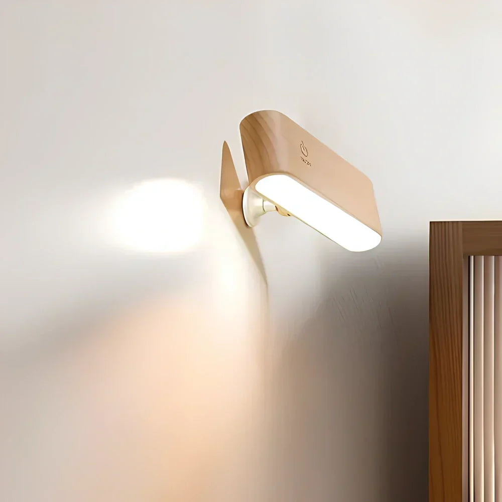 Applique murale LED magnétique sans fil, dimmable et orientable pour un éclairage moderne.