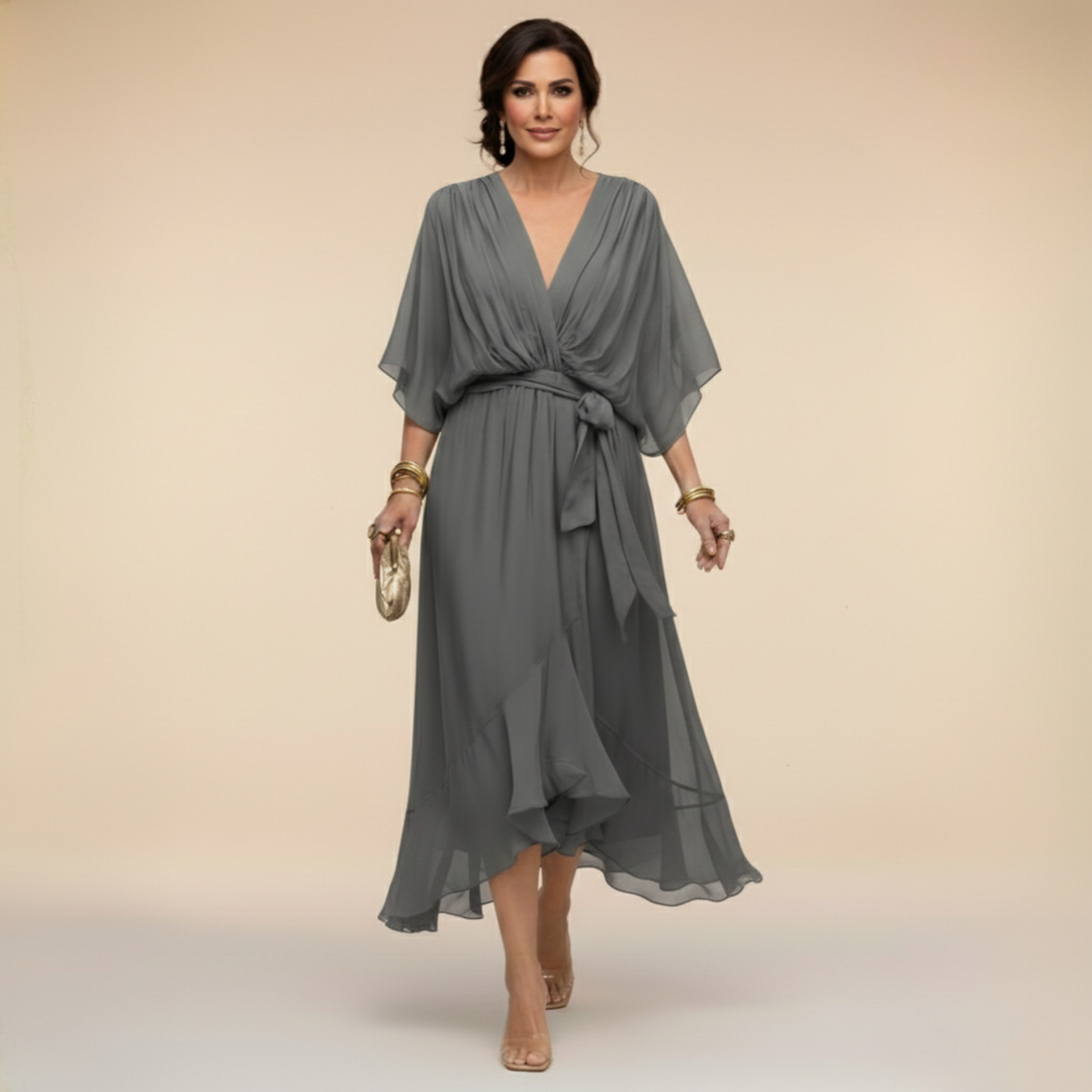 Superbe robe femme en chiffon fluide, col V, coupe élégante et ceinturée. Idéale pour soirée chic.