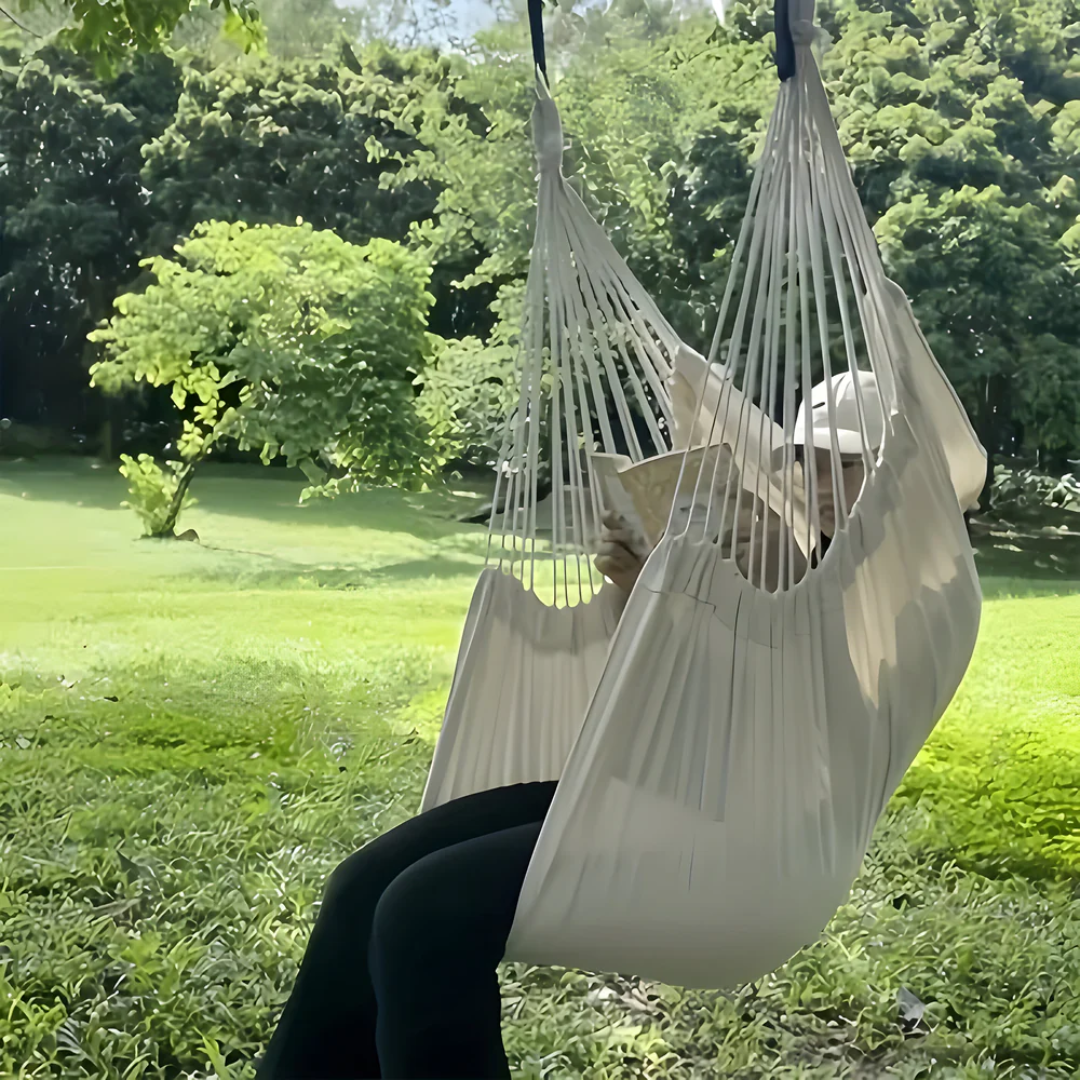 Fauteuil hamac suspendu coton gris pour moments de relaxation intérieure et extérieure stylée.