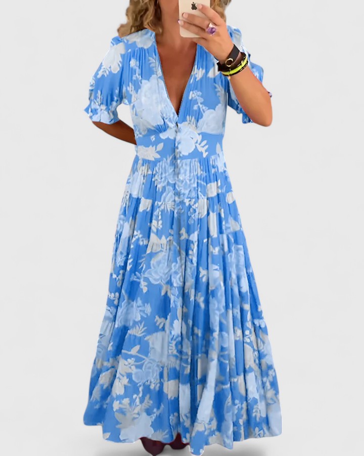 Élégante robe d'été fleurie pour femme, coupe longue et col V. Style décontracté et chic.