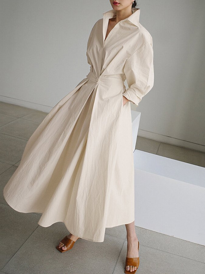 Robe midi boutonnée beige femme. Polyvalente, idéale pour le quotidien ou une occasion spéciale, mode féminine.