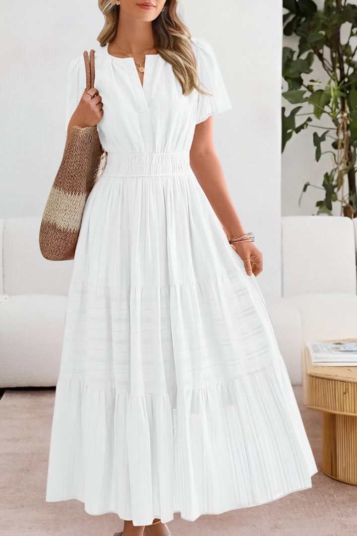 Élégante robe midi femme, coupe fluide bohème, ultra confortable pour l'été et les vacances.
