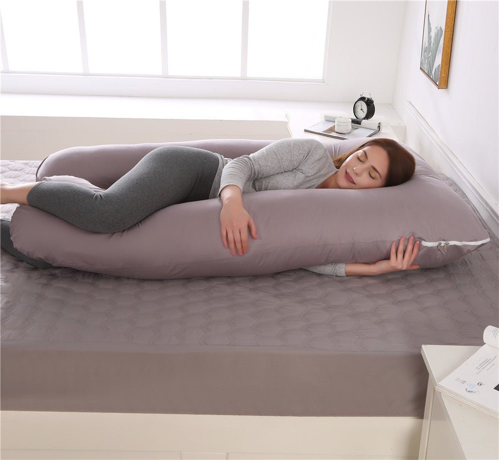Coussin de soutien thérapeutique pour un confort corps entier, idéal pour la relaxation et le bien-être au lit.
