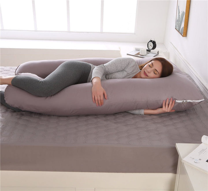 Coussin de soutien thérapeutique pour un confort corps entier, idéal pour la relaxation et le bien-être au lit.