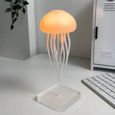 Lumière LED décorative AquaAura, ambiance méduse relaxante et multicolore. Idéale comme lampe de table ou cadeau.