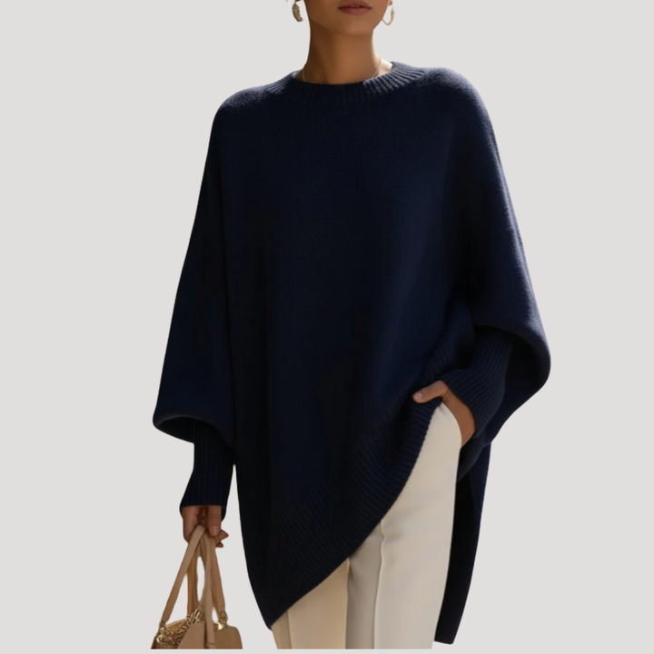 Magnifique pull poncho femme oversize, coupe ample assurant un confort unique et un style moderne.