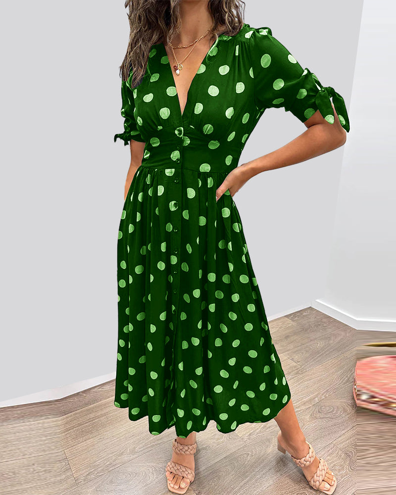 Robe fluide à pois pour femme, longueur midi, style chic et confortable pour l'été décontracté.