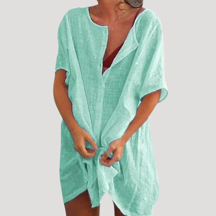 Élégante robe tunique femme avec col V, coupe confortable, idéale en toute saison.