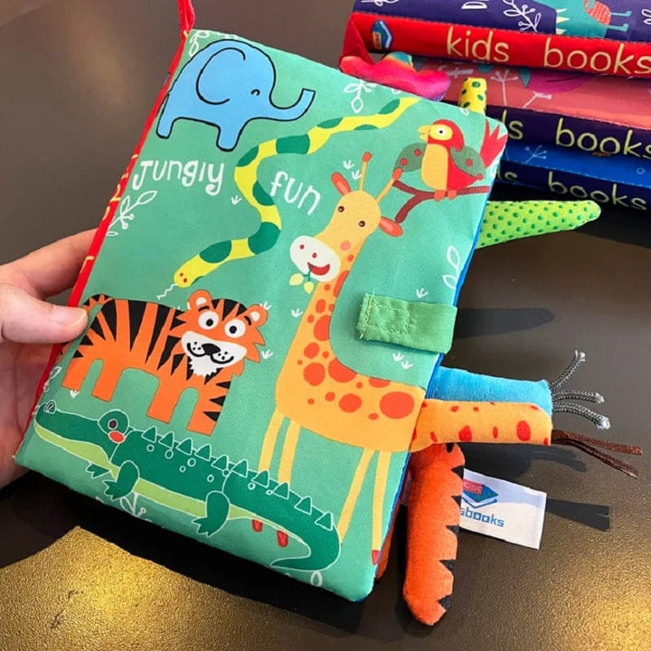 Livre interactif pour bébé, tissu doux, animaux colorés et sons pour stimuler l'exploration et le jeu.