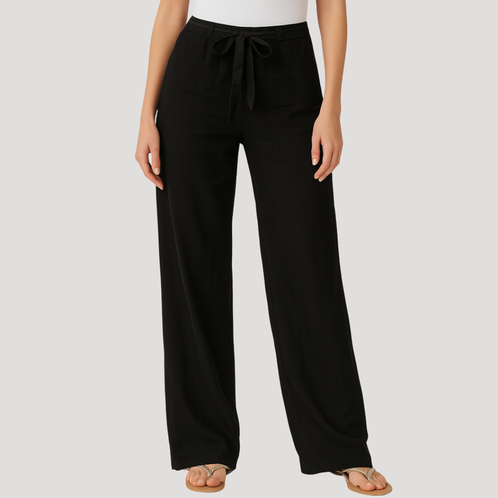 Pantalon femme en lin léger, taille élastique. Confort et style fluide pour l'été. Respirant et ample, mode décontractée.