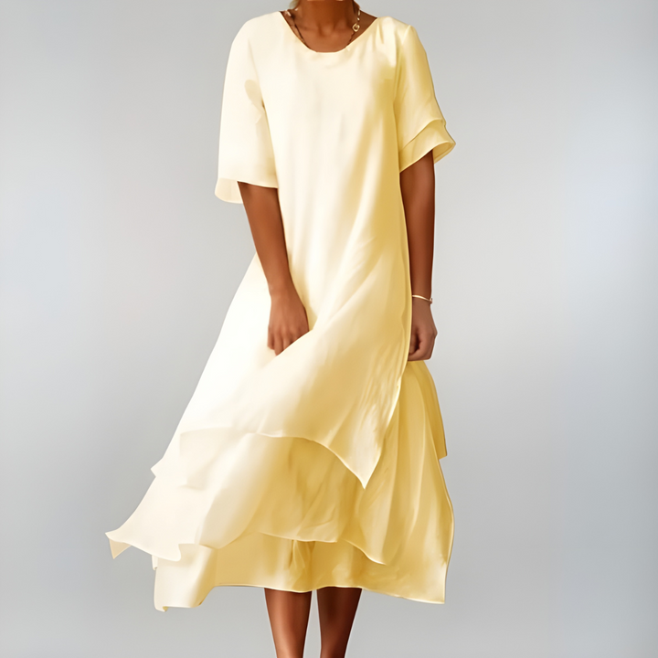 Robe fluide femme, confort léger et style polyvalent. Parfaite robe d'été élégante et décontractée pour toutes.