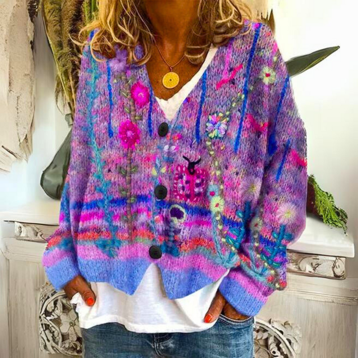 Mode femme: Cardigan bohème multicolore vibrant avec délicates broderies florales, parfait pour un style élégant.