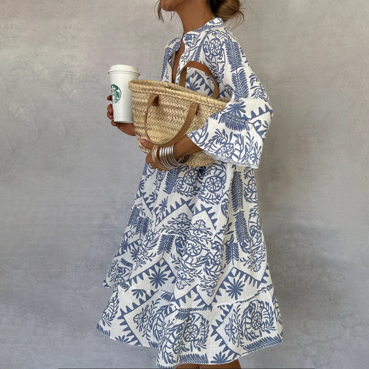 Robe maxi Anastasia fluide blanche à motif fleuri bohème, élégante pour femme en été, décolleté V.