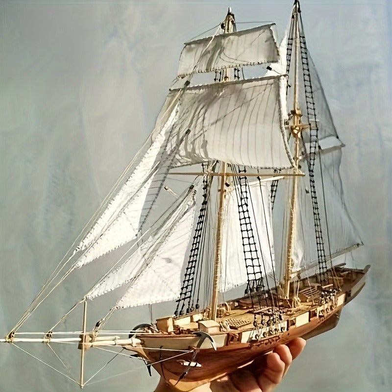Maquette à construire de bateau à voile classique en bois, une activité manuelle pour décoration marine.