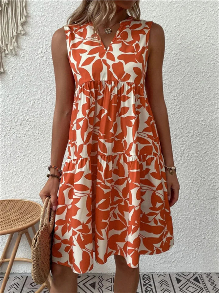 Robe fleurie femme, estivale et confortable. Idéale pour la plage ou un look casual de printemps.