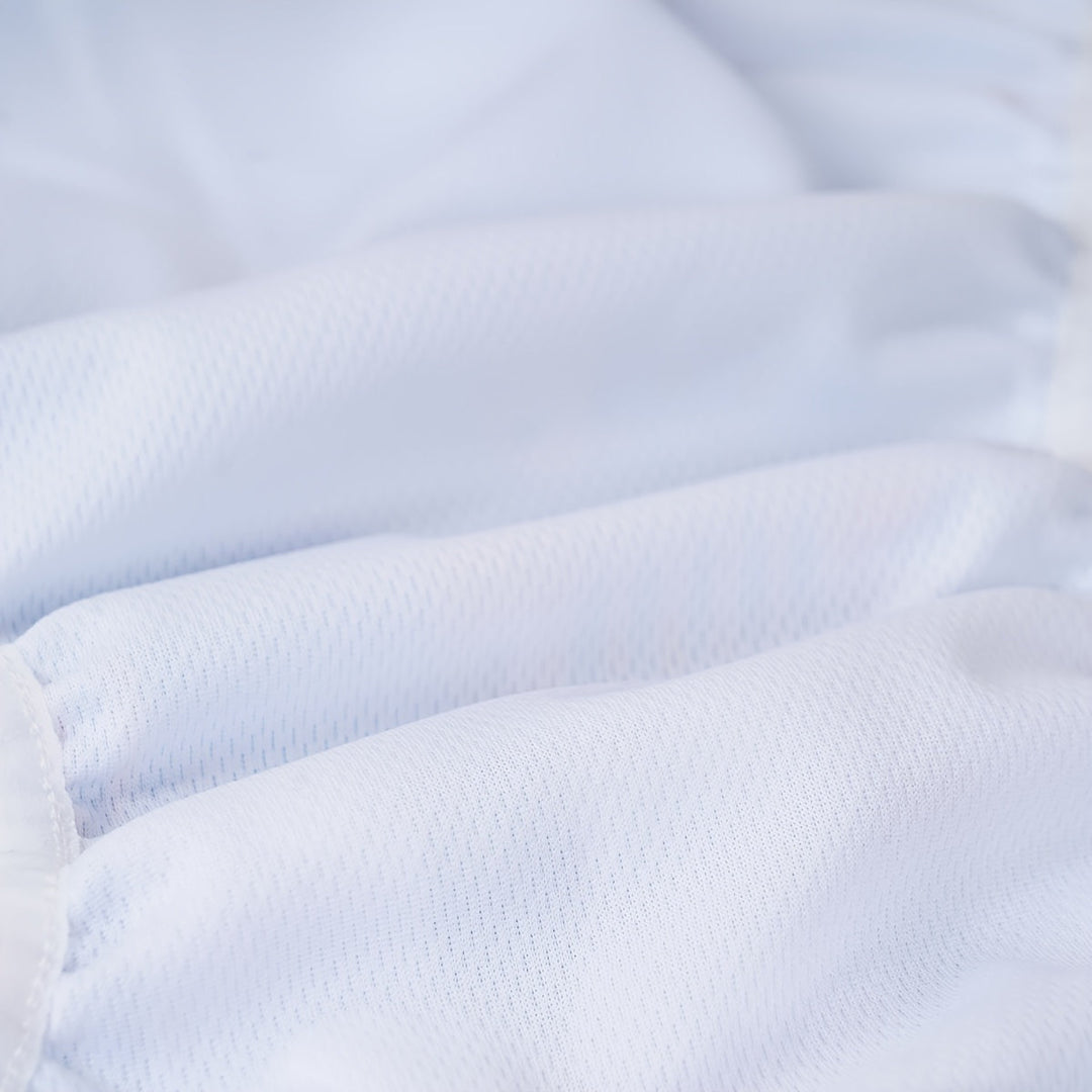 Culotte de bain bébé ajustable et écologique, motifs poissons. Parfaite pour la piscine et les vacances.