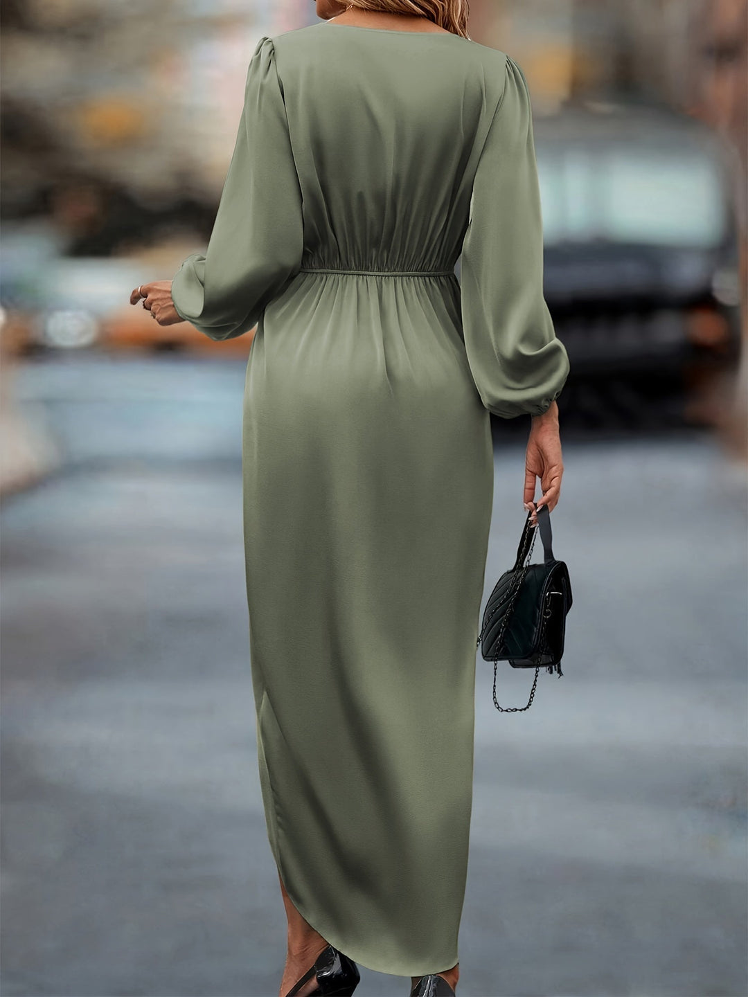 Robe maxi élégante femme, design unique avec manches ballon et ourlet asymétrique. Idéale pour grandes occasions.