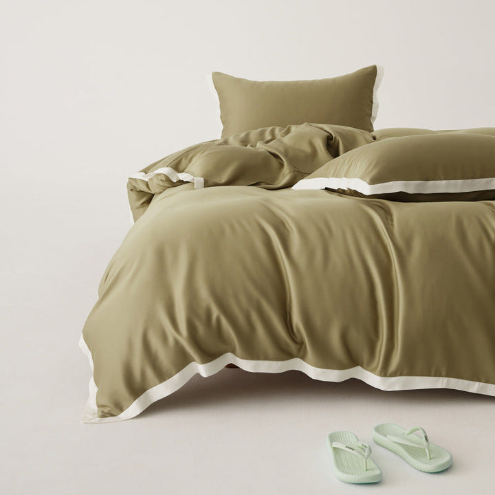 Ensemble de literie Tencel patchwork luxueux, housse de couette et taies, doux et respirant pour chambre moderne.