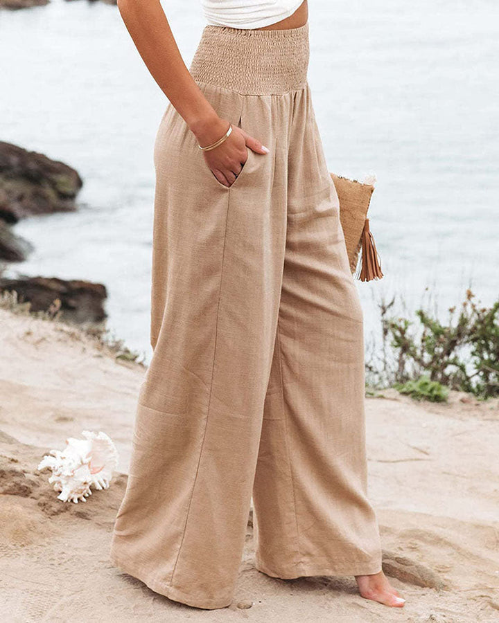 Pantalon femme palazzo noir, décontracté et chic, tissu fluide, jambes larges, essentiel été.