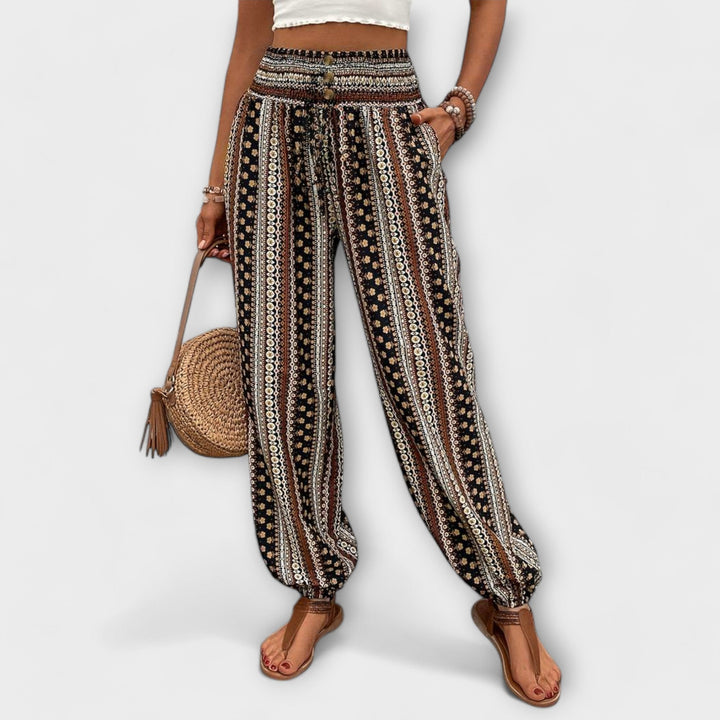 Pantalon Scarlett femme à motif ethnique unique, élégant et confortable pour toutes occasions.