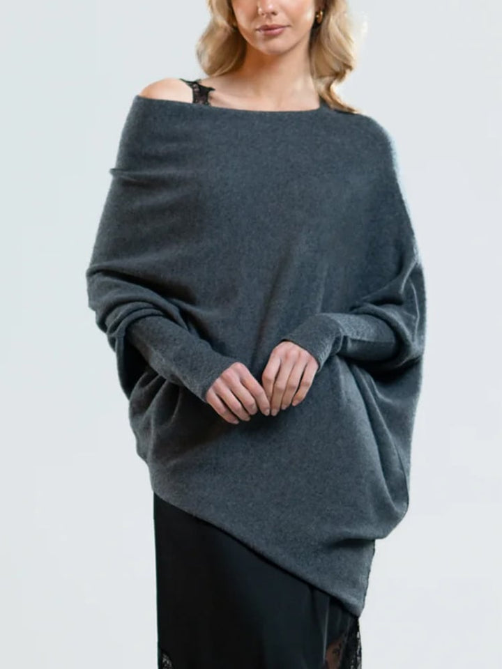 Pull femme douillet à manches longues pour l'hiver. Élégant et confortable, idéal pour une tenue décontractée chaude.
