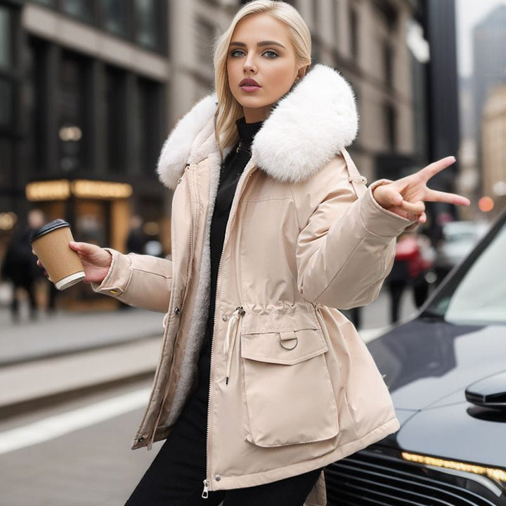 Superbe parka matelassée femme, alliant chaleur, style urbain et protection pour l'hiver.