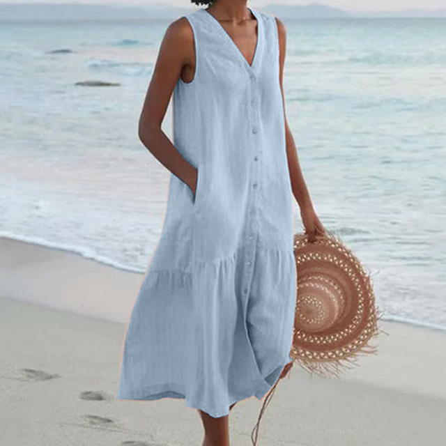 Robe d'été femme ample et confortable, boutonnée. Idéale pour un look décontracté ou élégant et polyvalent.