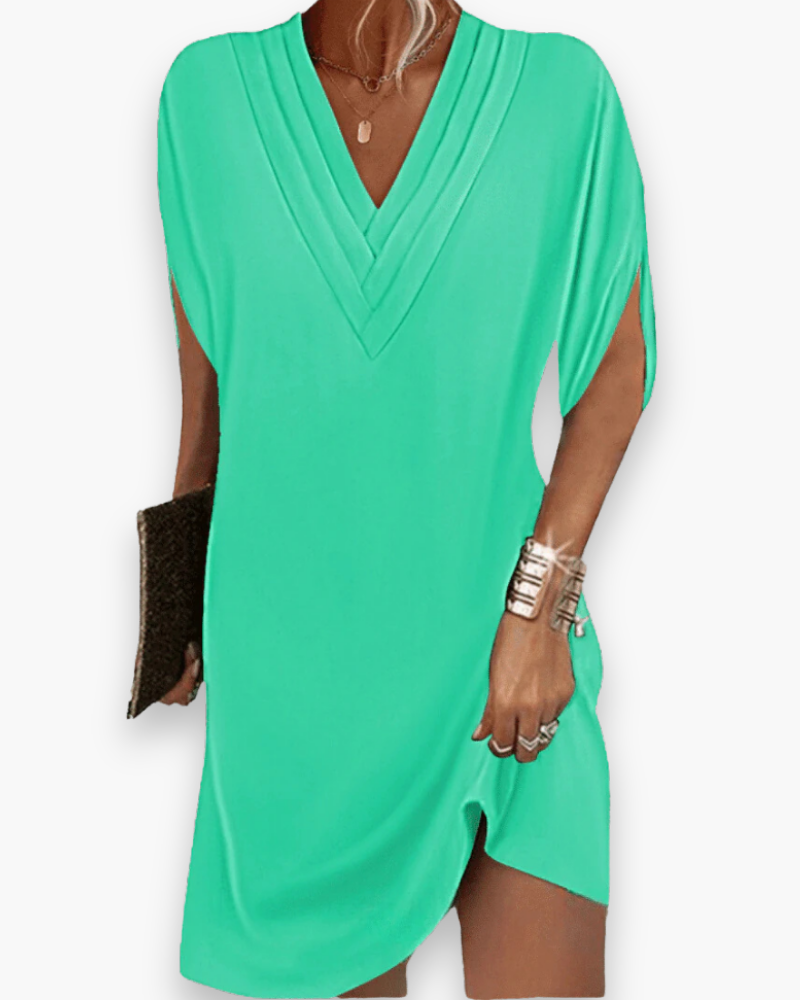 Robe mini rose poudré femme à col V, style élégant et décontracté. Idéale pour l'été et les sorties.