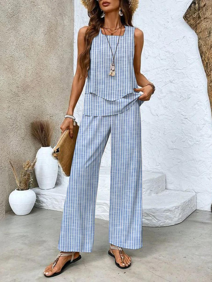 Ensemble femme Ghislaine floral stylisé, haut fleuri et pantalon confortable. Tenue élégante printemps été.