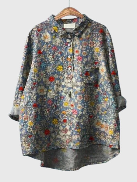 Blouse femme, imprimé fleuri frais, allie confort et élégance pour le quotidien.