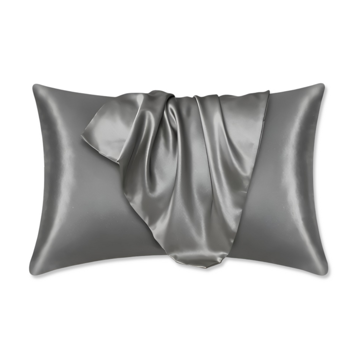 Taie d'oreiller unie et moderne en polyester pour une décoration élégante.