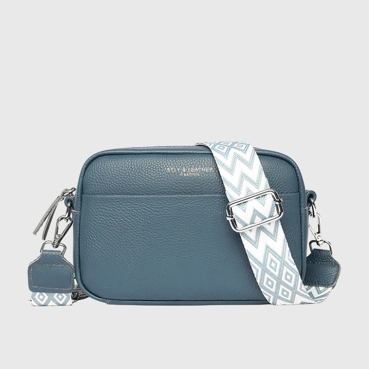 Sac bandoulière en cuir kaki, élégant et pratique pour femme organisée, un accessoire mode chic.