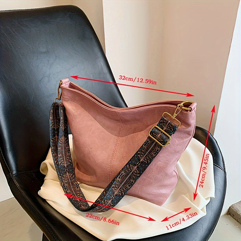 Sac bandoulière femme rétro chic, design géométrique, parfait pour un look moderne et spacieux.