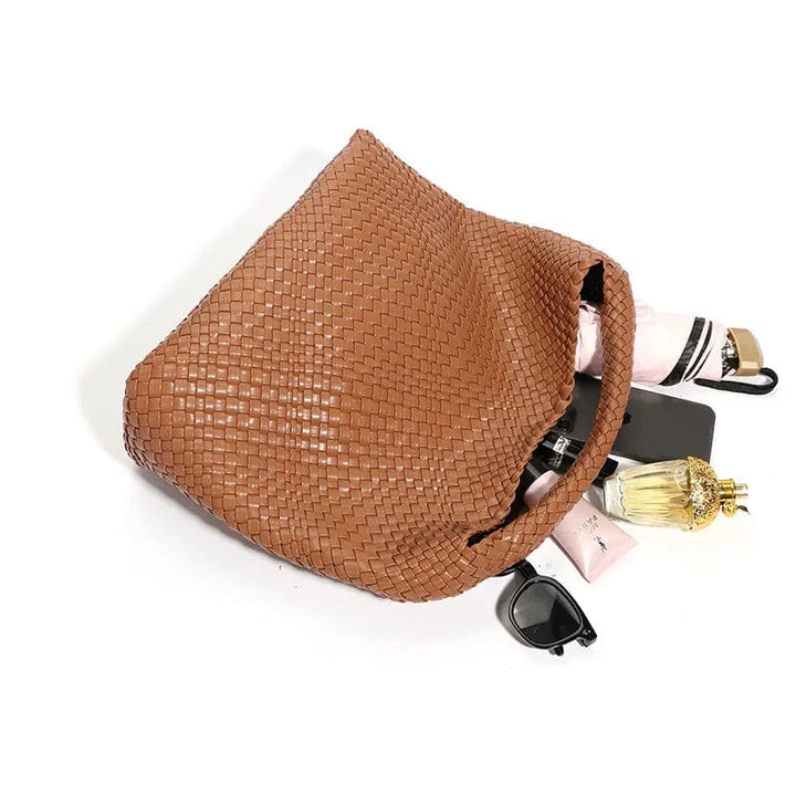 Sac cabas noir tressé en cuir PU, chic et polyvalent. Idéal comme fourre-tout de voyage ou de ville.