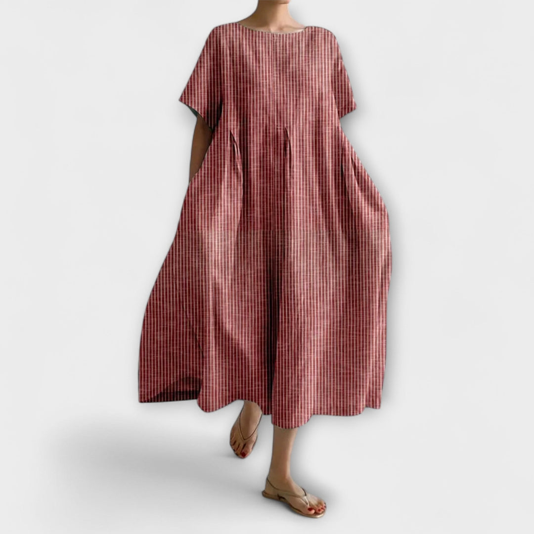Tenue printanière : robe longue femme élégante sans effort, matière légère et confortable pour un style décontracté.