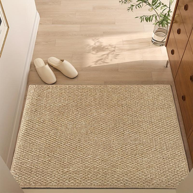 Tapis d'entrée durable et anti-saleté, tissé avec soin pour un intérieur propre et un accueil chaleureux.