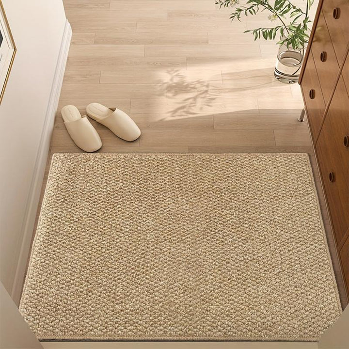 Tapis d'entrée durable et anti-saleté, tissé avec soin pour un intérieur propre et un accueil chaleureux.