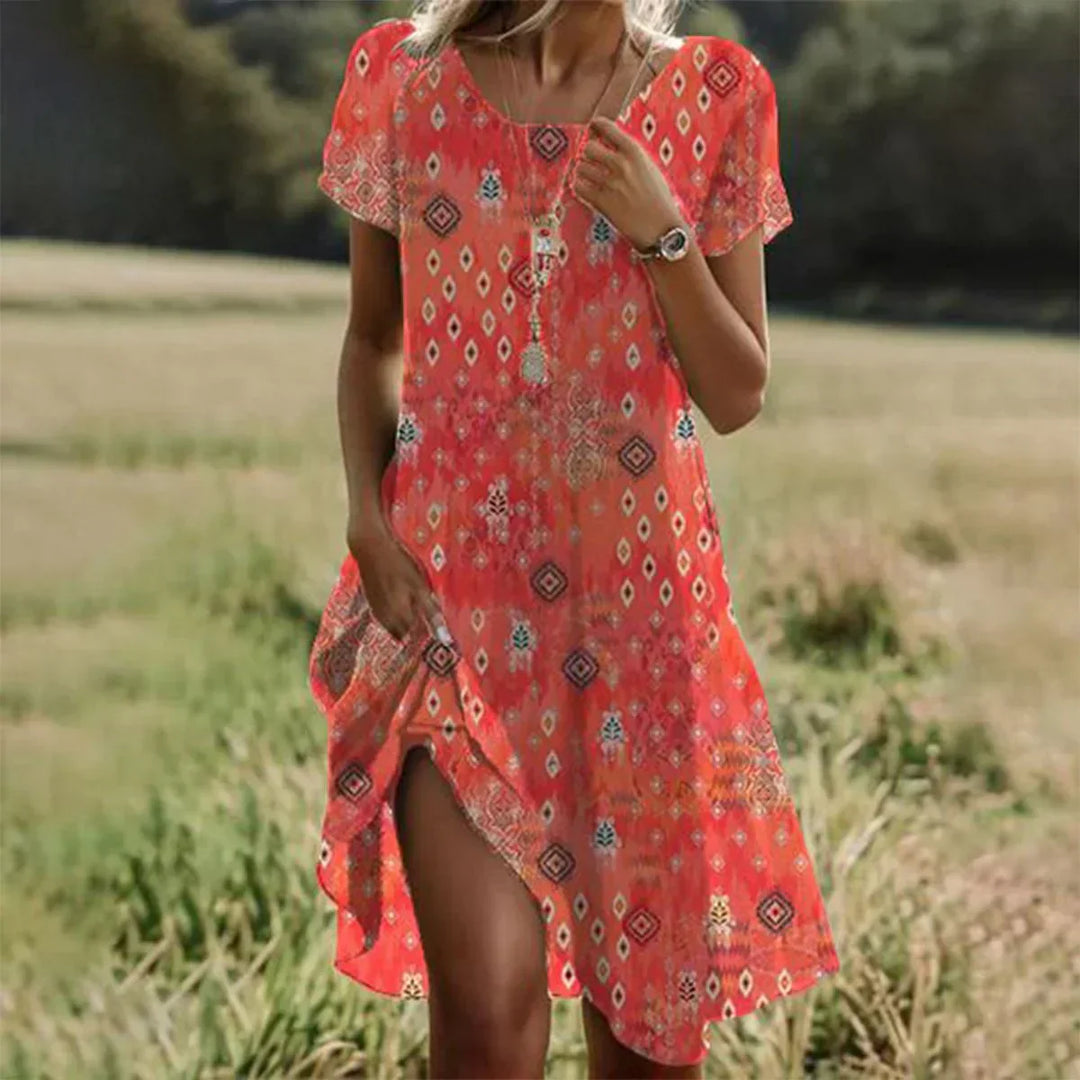 Robe midi orange chic pour femme, manches courtes, coupe confortable et élégante, parfaite pour l'été.