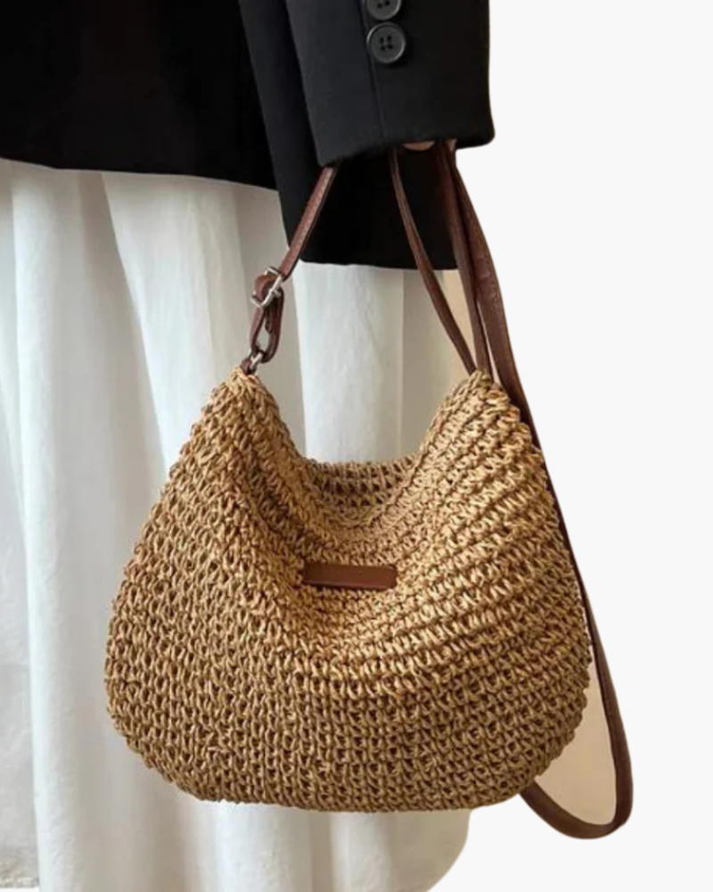 Sac épaule tissé bohème pour femme. Accessoire estival chic, idéal pour un style décontracté et élégant.