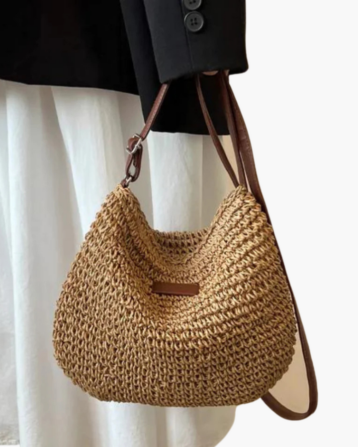 Sac épaule tissé bohème pour femme. Accessoire estival chic, idéal pour un style décontracté et élégant.