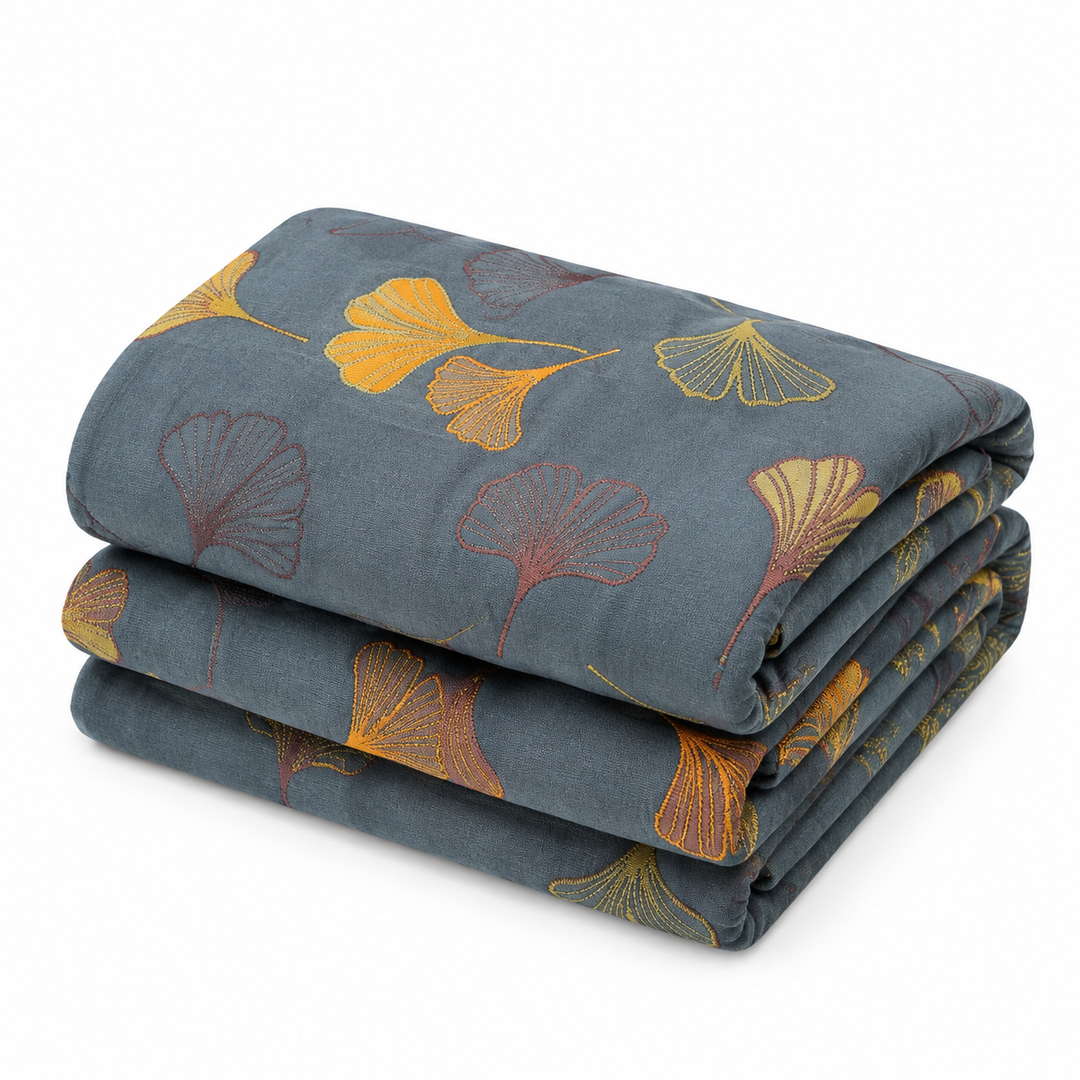 Couette réversible design feuilles de Ginkgo jaune et bleu. Parfaite pour une chambre moderne et naturelle, linge de lit entretien facile.