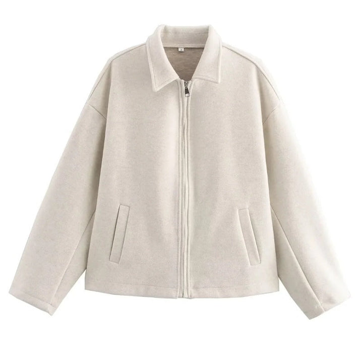 Veste courte femme bordeaux élégante à fermeture éclair, un indispensable chic pour la mode féminine d'automne.