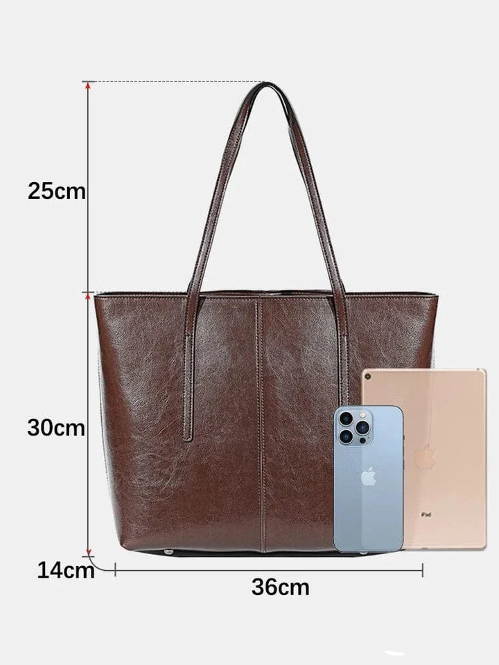 Sac cabas épaule femme en cuir, élégant et pratique avec compartiments pour ordinateur.