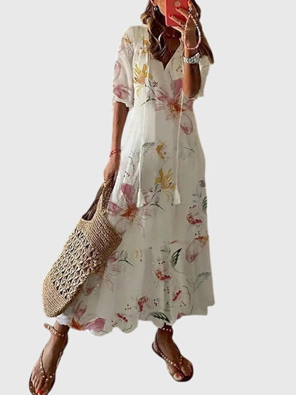 Robe maxi bohème d'été pour femme, design floral vintage, idéale pour un look décontracté.