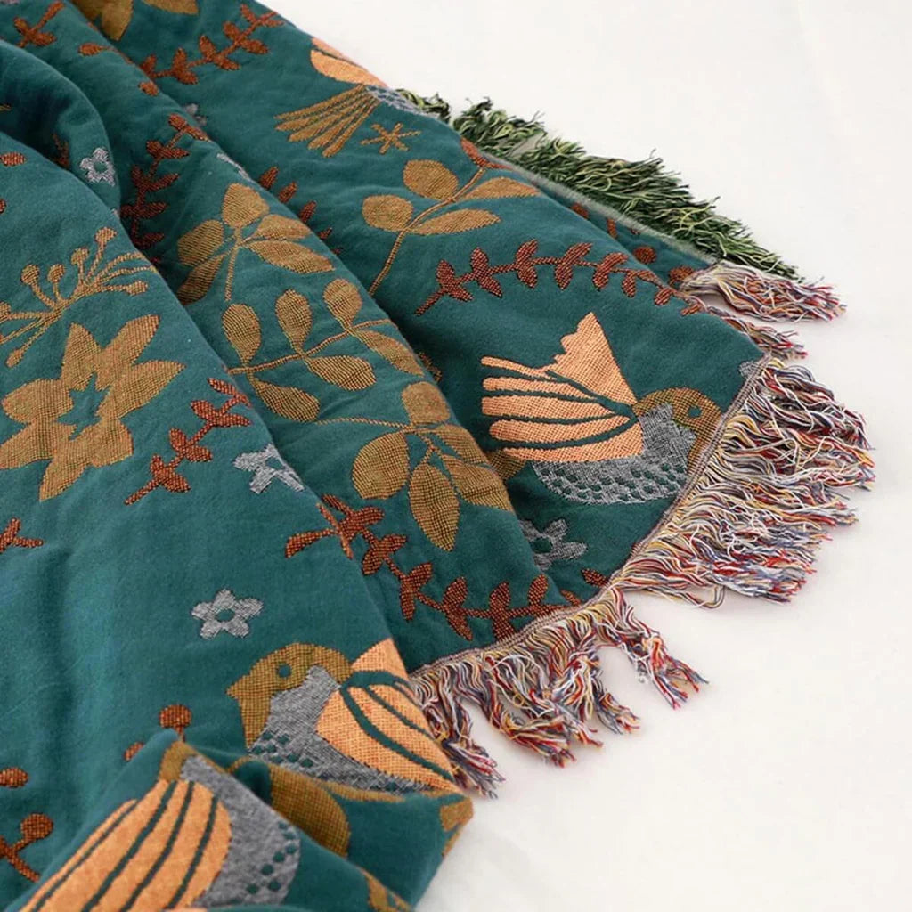 Textile coton confortable, plaid scandinave réversible motifs oiseaux pour une ambiance chaleureuse.