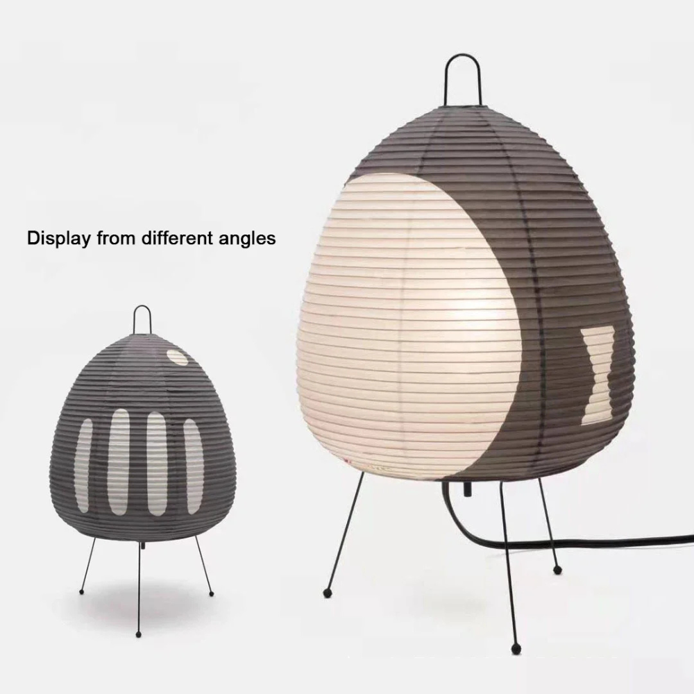Lampe de sol Japandi en papier de riz, design minimaliste, apporte sérénité au salon.