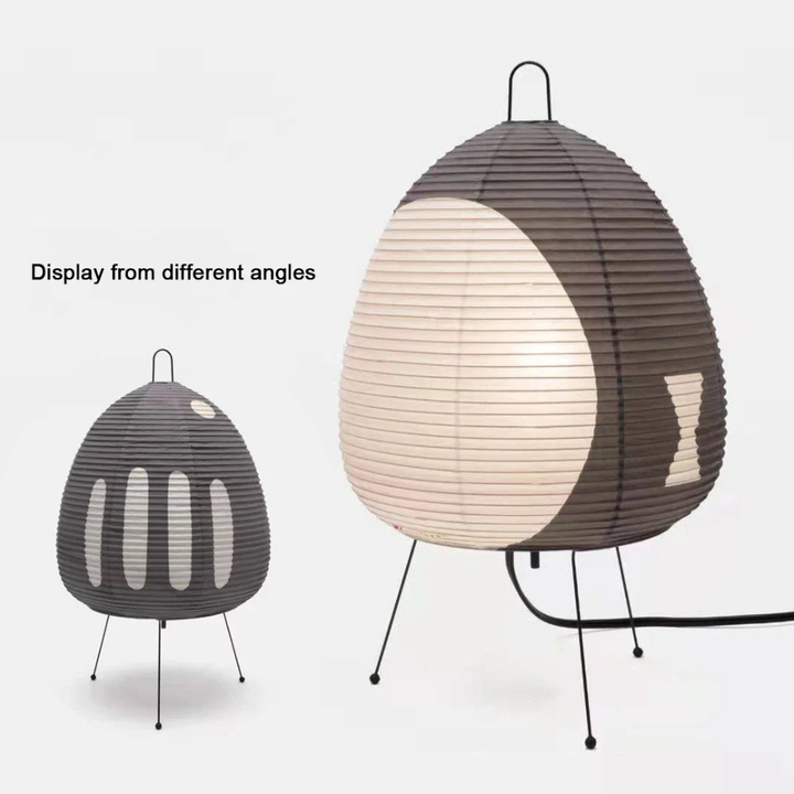 Lampe de sol Japandi en papier de riz, design minimaliste, apporte sérénité au salon.
