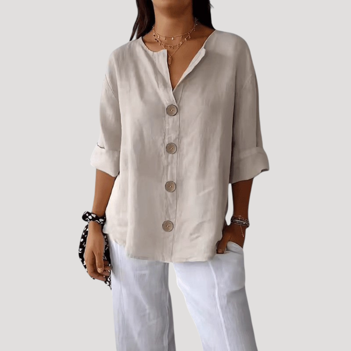 Blouse femme confortable à coupe décontractée, col V. Élégance facile pour le bureau ou les sorties entre amies.